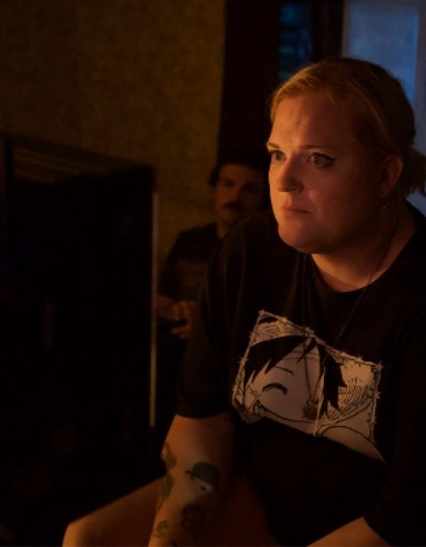 Director Alison Mattingly sitting behind a monitor