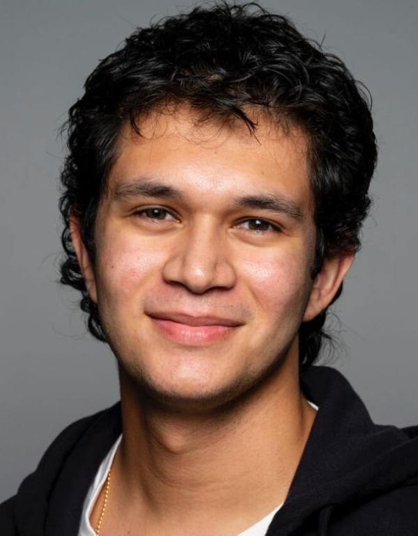 J. Mendoza smiling