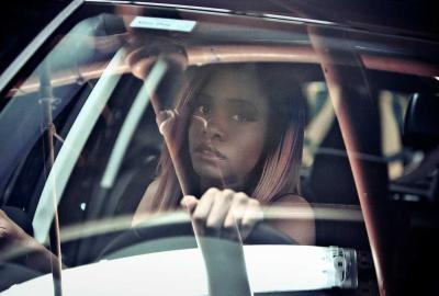 Prey film still woman drives a car